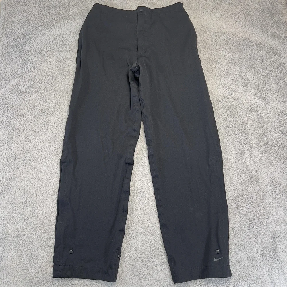 Nike Golf Storm Fit Rain Pants Mens L Black Waterproof Windproof Zip Cuff 267354